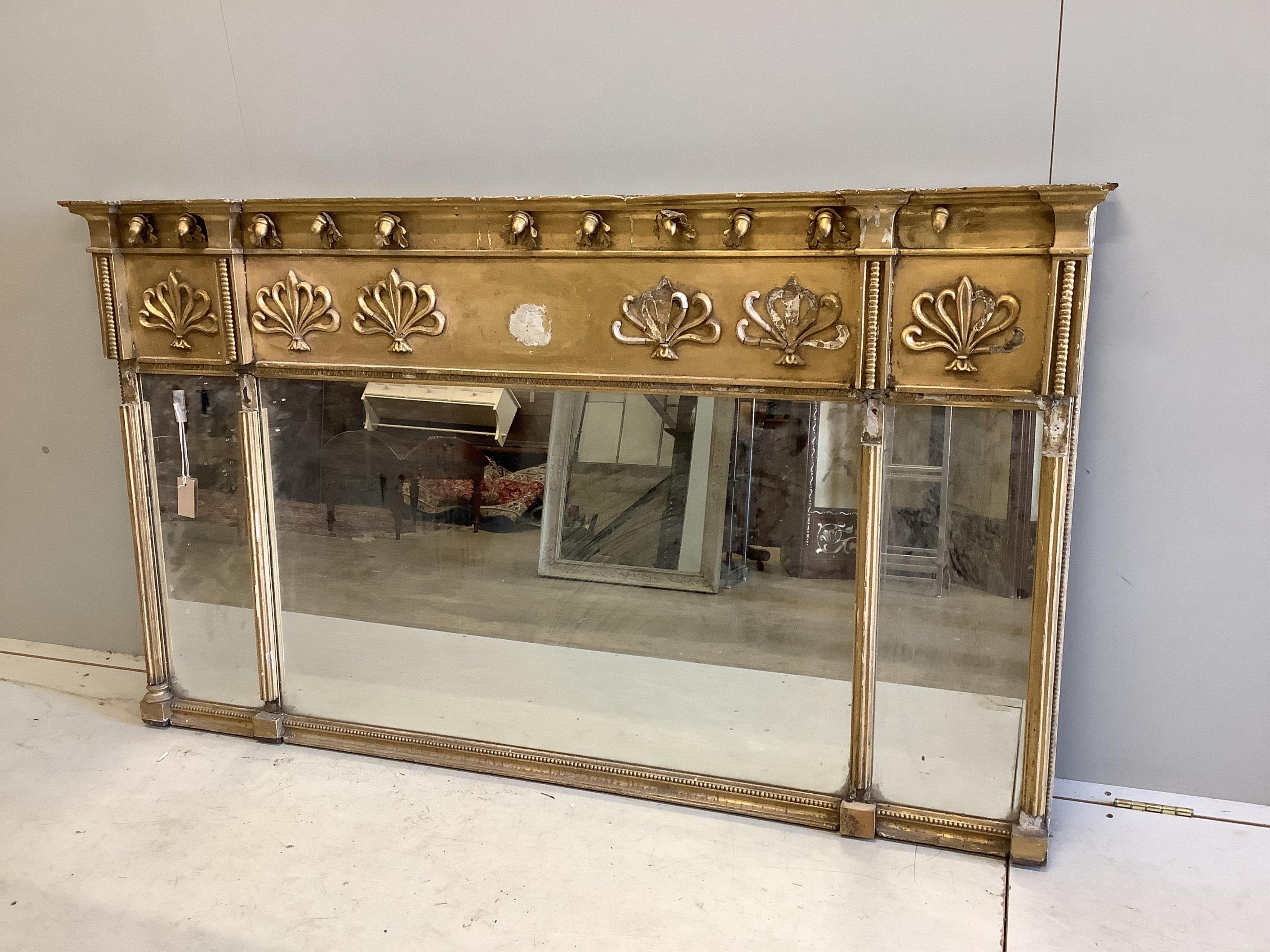 A Regency giltwood and composition triple plate overmantel mirror, width 161cm, height 94cm. Condition - poor, in need of restoration